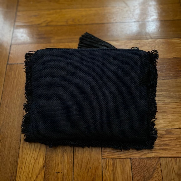 M&S black clutch with off white flowers. - Picture 2 of 4